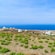 Farmland overlooking the water in Santorini, Greece